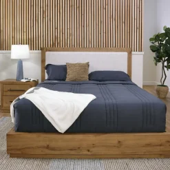 Nola Eastern King Upholstered Bed