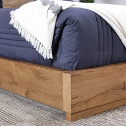 Nola Eastern King Upholstered Bed