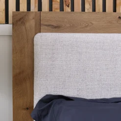 Nola Eastern King Upholstered Bed