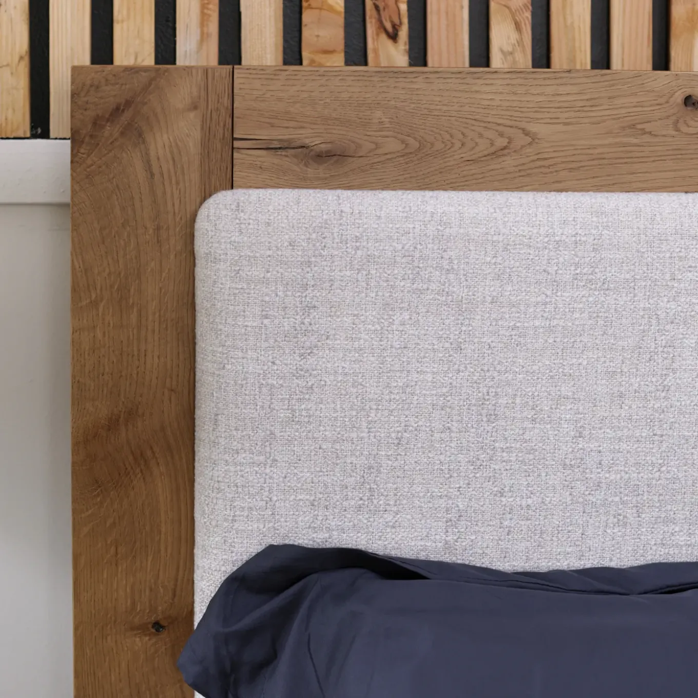 Nola Eastern King Upholstered Bed
