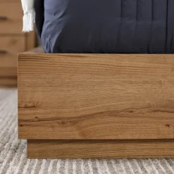 Nola Eastern King Upholstered Bed
