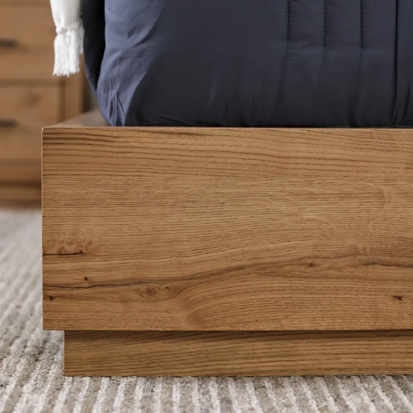 Nola Eastern King Upholstered Bed